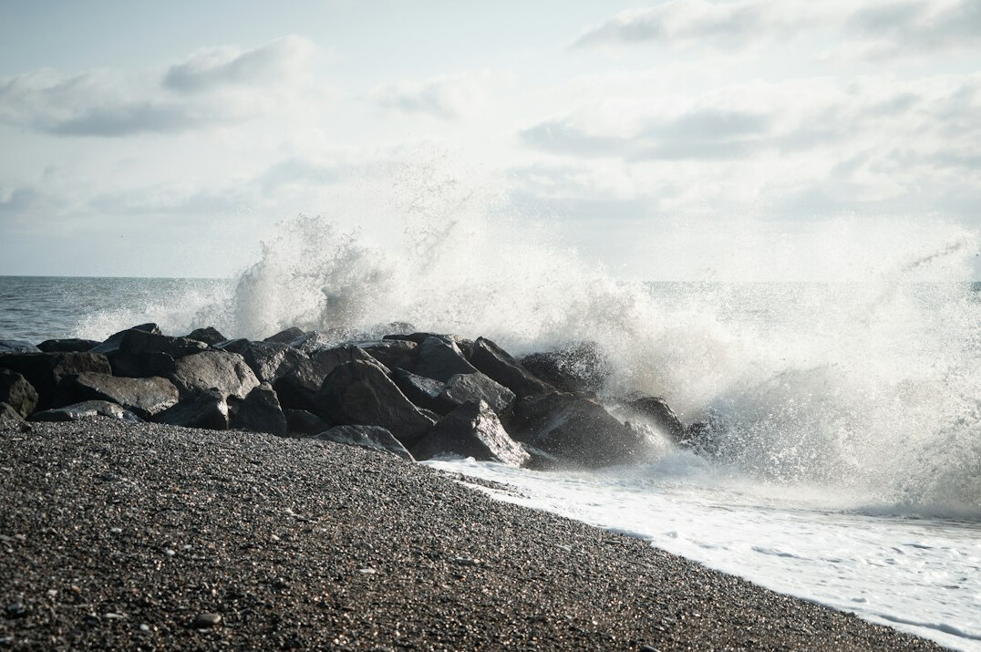 Waves crashing on a rocky Danish beach
